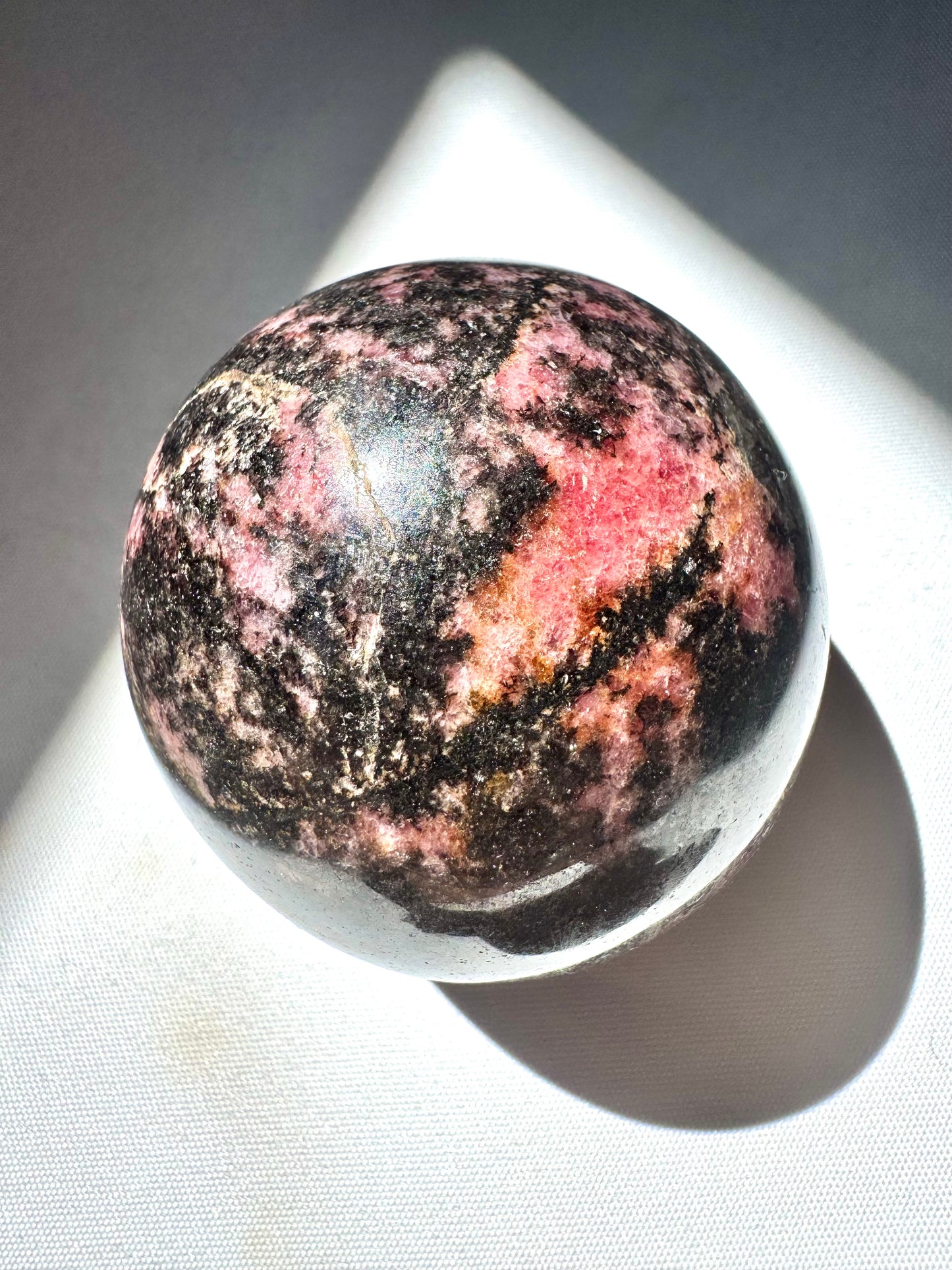 Rhodonite Sphere | Bespoke Crystals